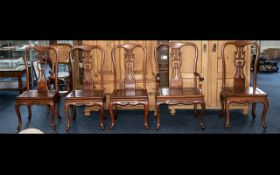 A Set of Five Hardwood Chinese Chairs comprising of 4 stand chairs and 1 carver.