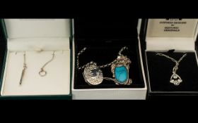 A Mixed Lot of Silver Jewellery to include three silver pendants and chains. Together with one