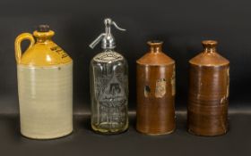 Collection of Flagon Ware to include large beige flagon inscribed 'Scott's (Bolton) Ltd -