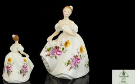 Royal Doulton Figure 'Marilyn' designed by Peter A Gee, HN 3002. Depicts a lady in a long evening