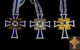 The Cross of Honour of the German Mother, Three Enamelled Medals All With Ribbons,