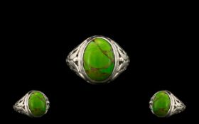 Mojave Green Turquoise Solitaire Ring, an oval cut cabochon of 5cts of the lime green version of