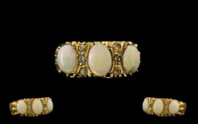 Antique Period 9ct Gold Opal and Diamond Dress Ring gypsy setting. marked 9ct gold. Ring size N 4.