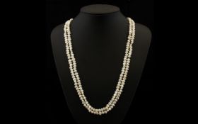 Freshwater Pearl Necklace Ladies long contemporary necklace. Good condition, approx 28 inches in