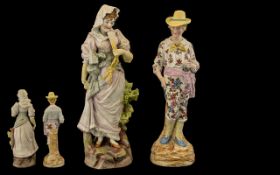 Pair of German Bisque Porcelain Figurines depicting a country gentleman in a floral suit and straw