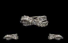 18ct White Gold Contemporary Nice Quality Baguette & Brilliant Cut Diamond Set Dress Ring. The round