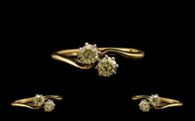 Ladies 1920's Attractive Two Stone Diamond Set Ring Marked 18ct. The old round cut diamond of good