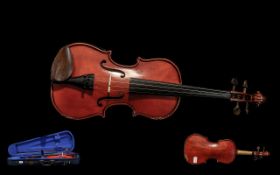 Violin in Case. 3/4 size violin in blue fabric case with shoulder strap, with bow and spare strings.