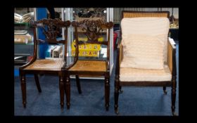 Bergere Worked Arm Chair raised on brass castors.