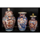 A Collection of Three Japanese Imari Vases all of typical form, one lidded,