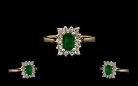 Ladies 9ct Gold - Attractive Emerald and Diamond Set Cluster Ring of Rectangular Form, The Central