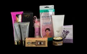 Box of Cosmetics including Body Shop Vanilla Chai body scrub;