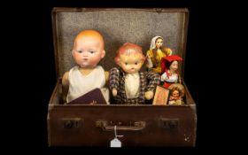 Collection of Vintage Dolls in suitcase,