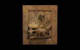 Oriental Wood Carving Picture. Early 20th/late 19th century wood carving set in a frame depicting