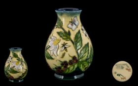Moorcroft Tubelined & Contemporary Designed Vase decorated in the strawberry plant and butterfly