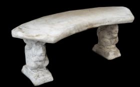 Squirrel Seat - A curved squirrel seat on squirrel plinths.