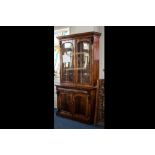 Late Victorian Mahogany Bureau Bookcase with a glazed top above a frieze drawer.