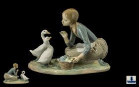 Lladro - Porcelain Figure Group ' Feeding the Ducks ' Model No 4849. Issued 1973 - 1995. Height 6.