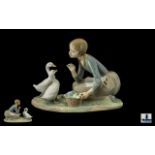 Lladro - Porcelain Figure Group ' Feeding the Ducks ' Model No 4849. Issued 1973 - 1995. Height 6.