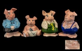 A Collection of Four Family Wade Pigs.