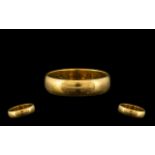 18ct Gold Hallmarked Wedding Band. Ring Size Q. 4.9 grams. Please see photographs.