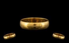 18ct Gold Hallmarked Wedding Band. Ring Size Q. 4.9 grams. Please see photographs.