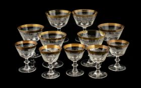 A Collection Of Bohemian Glass To Include Six Large Champagne And A Further Six Smaller Glasses.