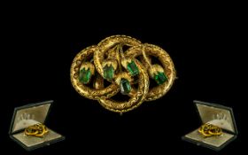Victorian Period Attractive 15ct Gold Flower Brooch Set with Emeralds circa 1860. With original box,