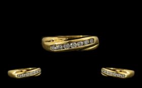 18ct Gold - Attractive Channel Set Diamond Ring, Full Hallmark for 750 - 18ct.