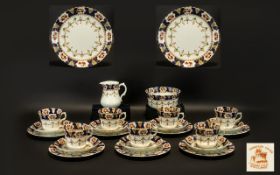 Part Tea Service 'Windsor' by J H Walton comprising 9 teacups, 12 saucers, 11 sandwich/cake plates,