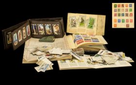 Album of Stamps - various cigarette and tea card albums with navy loose.