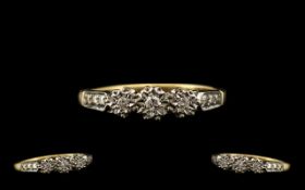18ct Gold Three Stone Diamond Ring set with three round brilliant cut diamonds - illusion set.