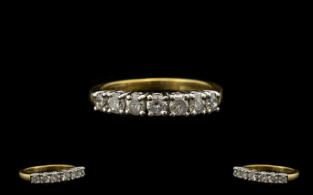 18ct Gold Attractive Seven Stone Diamond Set Dress Ring of Excellent Design. Full hallmark for 18ct.