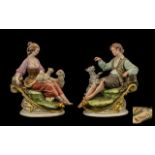 Capo-di-Monte Pair of Reclining Rustic Figures,