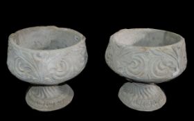 Two Acanthus Urns - two large acanthus urns decorated with acanthus leaves.