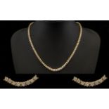 14ct Gold Superb Quality Stunning Graduated Diamond Set Necklace of Good Sparkle.