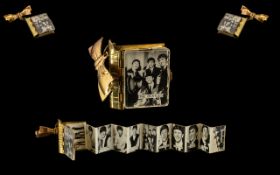 Beatles Interest - The Beatles Original 1960s Brooch/Badge/Pin in gold coloured metal. Case in shape