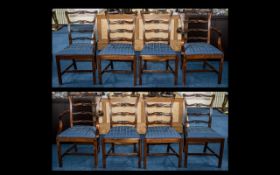 A Set of 8 Mahogany Georgian Style Ladder Back Dining Chairs. To include 2 carvers and 6 stand.