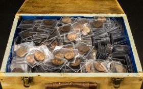 A Large Wooden Hinged Box Containing a quantity of one penny coins, all individually wrapped in