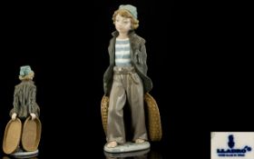 Lladro - Hand Painted Porcelain Figure ' Apprentice Seaman ' Model No 5055. Issued 1980 - 1985.