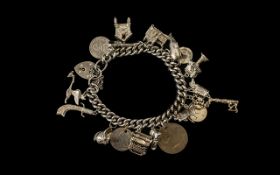 1960's - Sterling Silver Albert Bracelet Loaded with 20 Good Quality Silver Charms. All Marked for