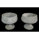 Two Acanthus Urns - two large acanthus urns decorated with acanthus leaves.