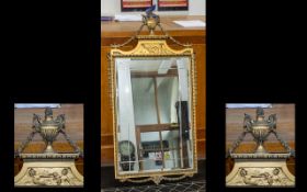 Mid 20thC Gilt Framed Mirror with bevelled glass and decorated with an Urn finial in the Adam's