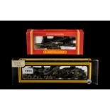 A Boxed Engine and Tender 00 Gauge D015 2P 4-4-0 LMs Black and a R.795 0-4-02 Loco Lionworks.