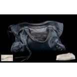 Ladies Navy Leather Balenciaga Bag with dust cover. Chrome placket inside bag engraved '