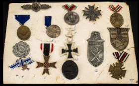 A Good Collection of 14 German Military Medals Mounted On A Single Card To Include Front Flying