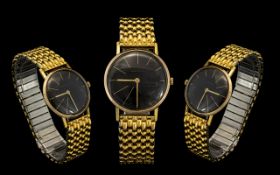 Gents 9ct Gold Round Cased Mechanical Wind Wrist Watch with Black Dial and Gold Markers, Seconds