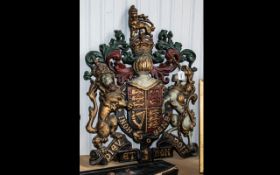 A 20thC Large English Cast Metal Royal Coat of Arms Shield painted in colours. Height 32 inches 23