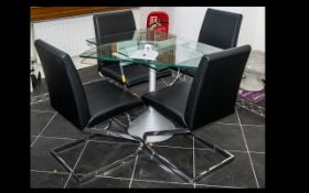 Contemporary Oval Glass Dining Table - on raised chrome supports. Comes with four chairs on a chrome