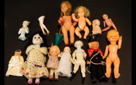 Collection of Small and Miniature Bisque, Plastic and Celluloid Dolls, including a Japanese Futamara